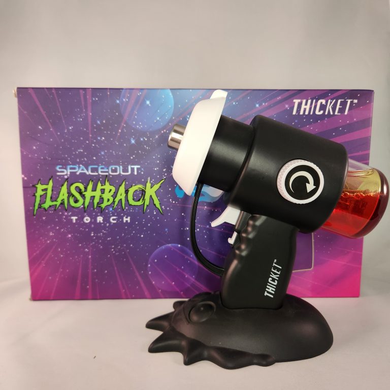 black blow torch in front of a box labeled flash back. white background