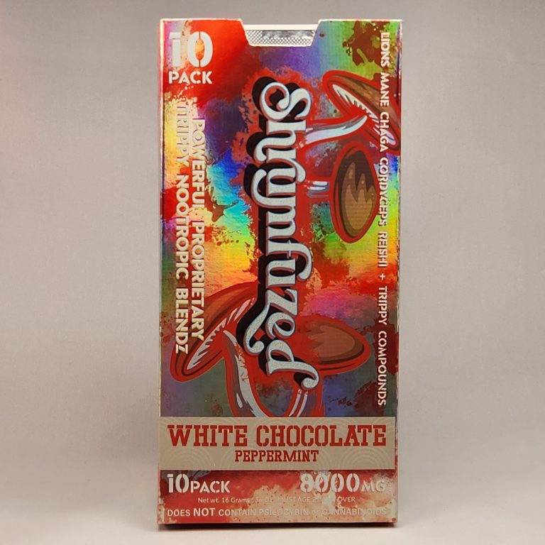 holographic Rainbow box labeled shrumfuzed white chocolate peppermint. white back drop.